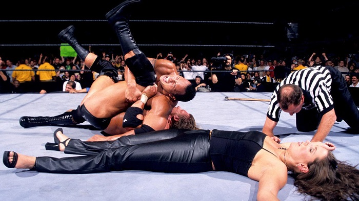 WWE Rock Triple H and Stephanie McMahon