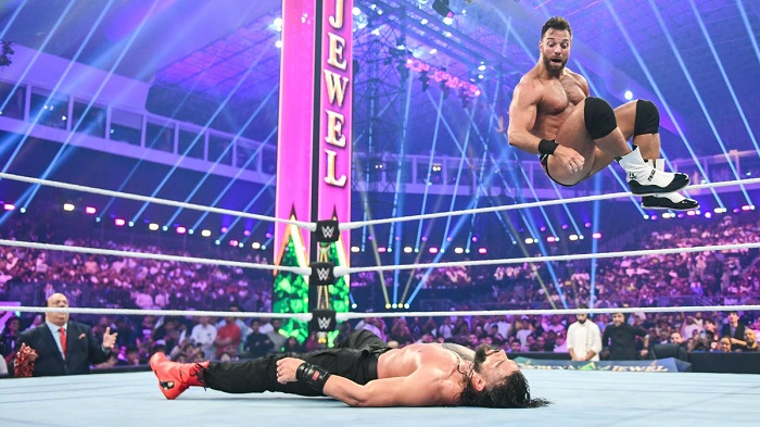WWE LA Knight and Roman Reigns