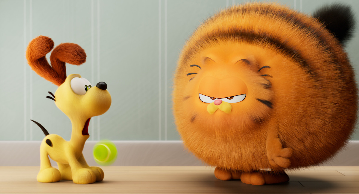 The Garfield Movie - Odie and Garfield (voiced by Chris Pratt) in THE GARFIELD MOVIE.