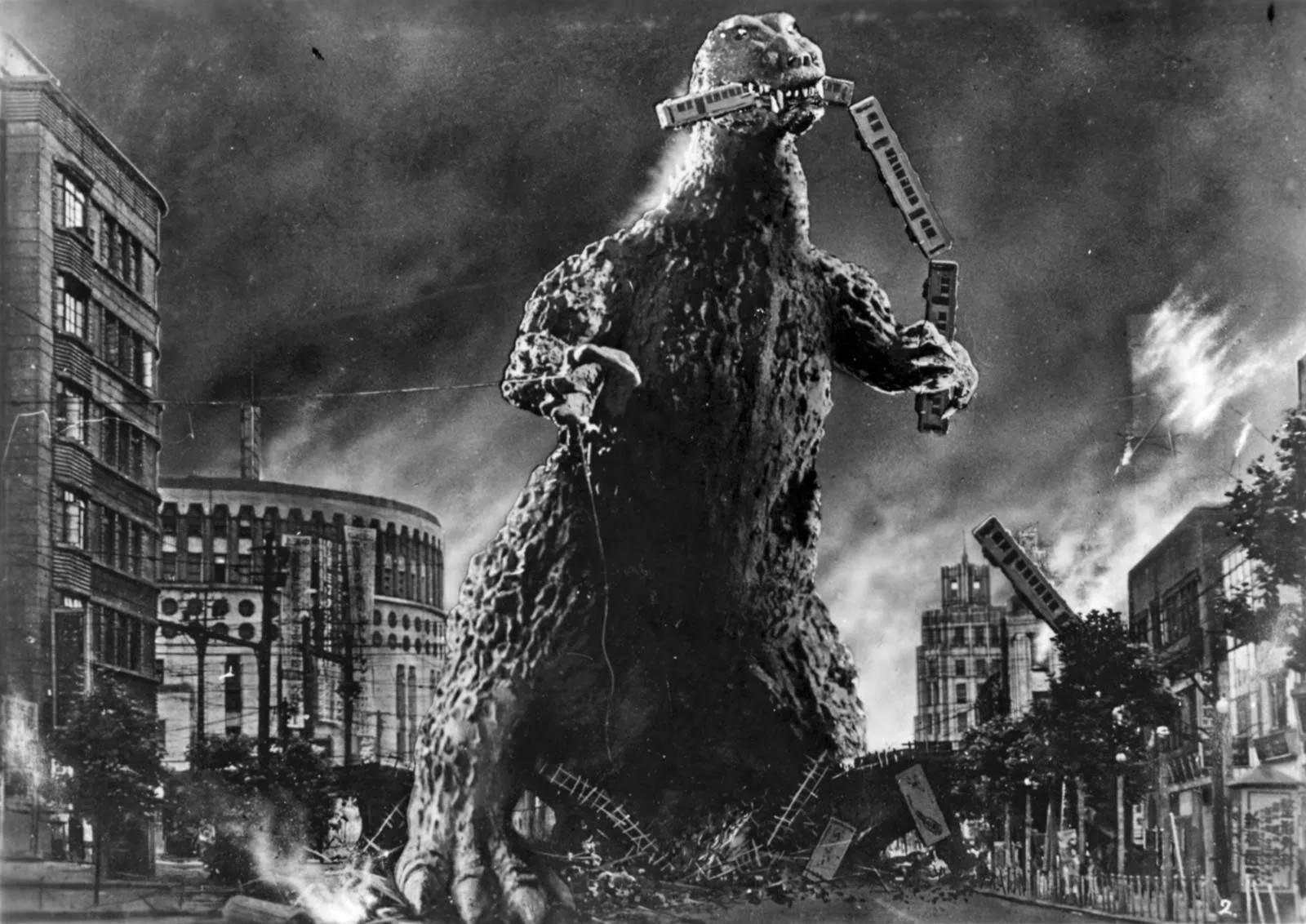 Godzilla (1954) eats a train
