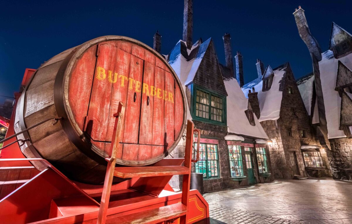 Harry Potter Butterbeer barrel in front of buildings